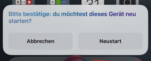 Screenshot des iPhone-Displays mit Meldung von Siri: Bitte bestätige: du möchtest dieses Gerät neu starten?